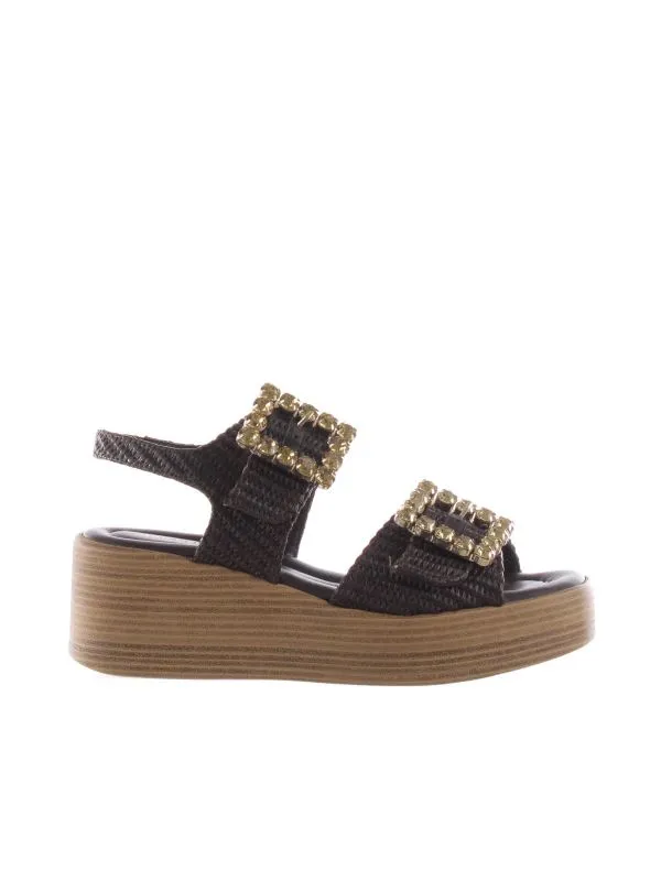 Sandalo in raffia con zeppa